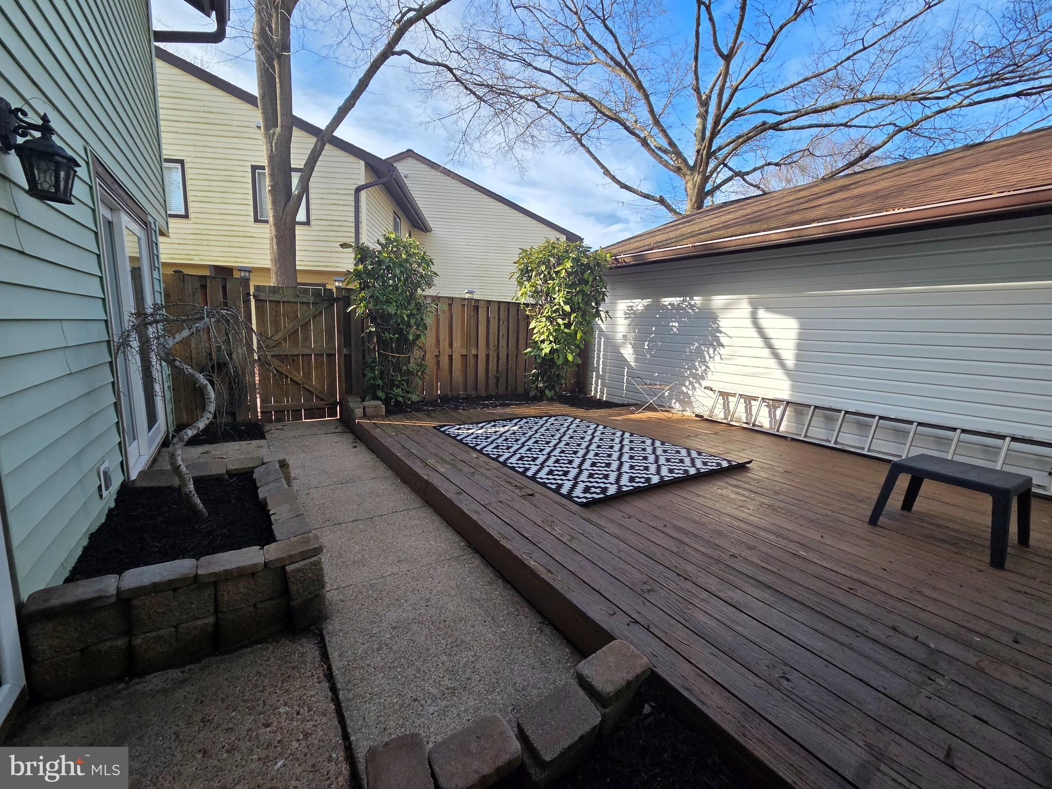 1729 Leisure Way Crofton, MD 21114 - Photo 19 of 20 a view of a backyard with sitting area