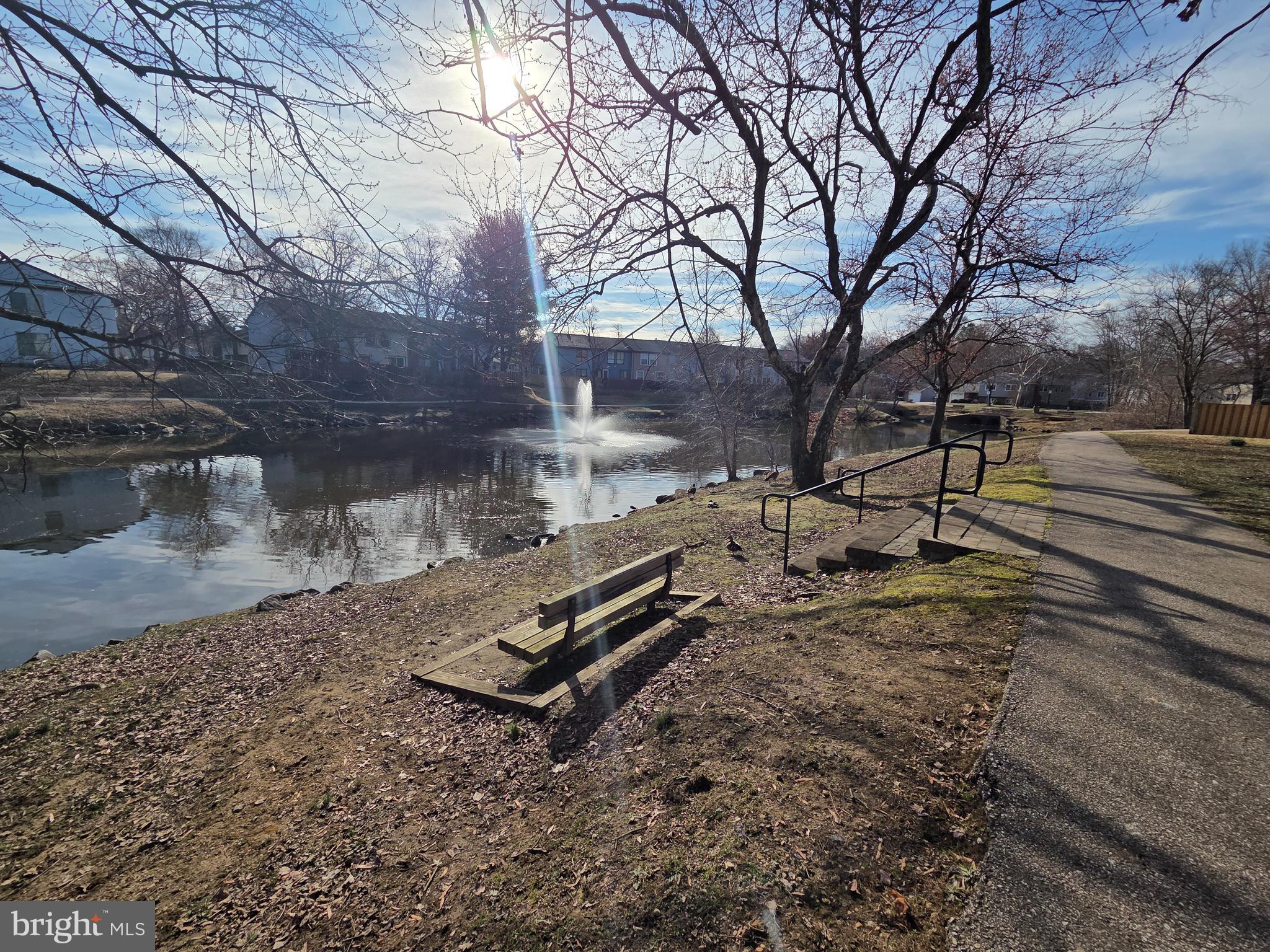 1729 Leisure Way Crofton, MD 21114 - Photo 4 of 20 a view of a backyard with wooden fence