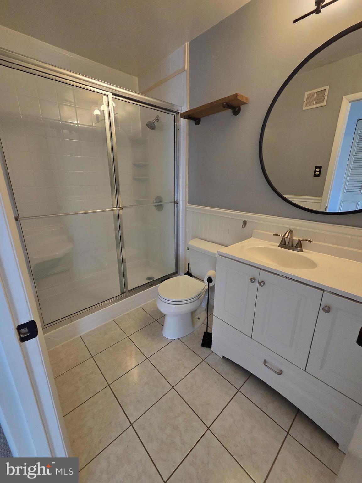 1729 Leisure Way Crofton, MD 21114 - Photo 5 of 20 a bathroom with a sink toilet and shower