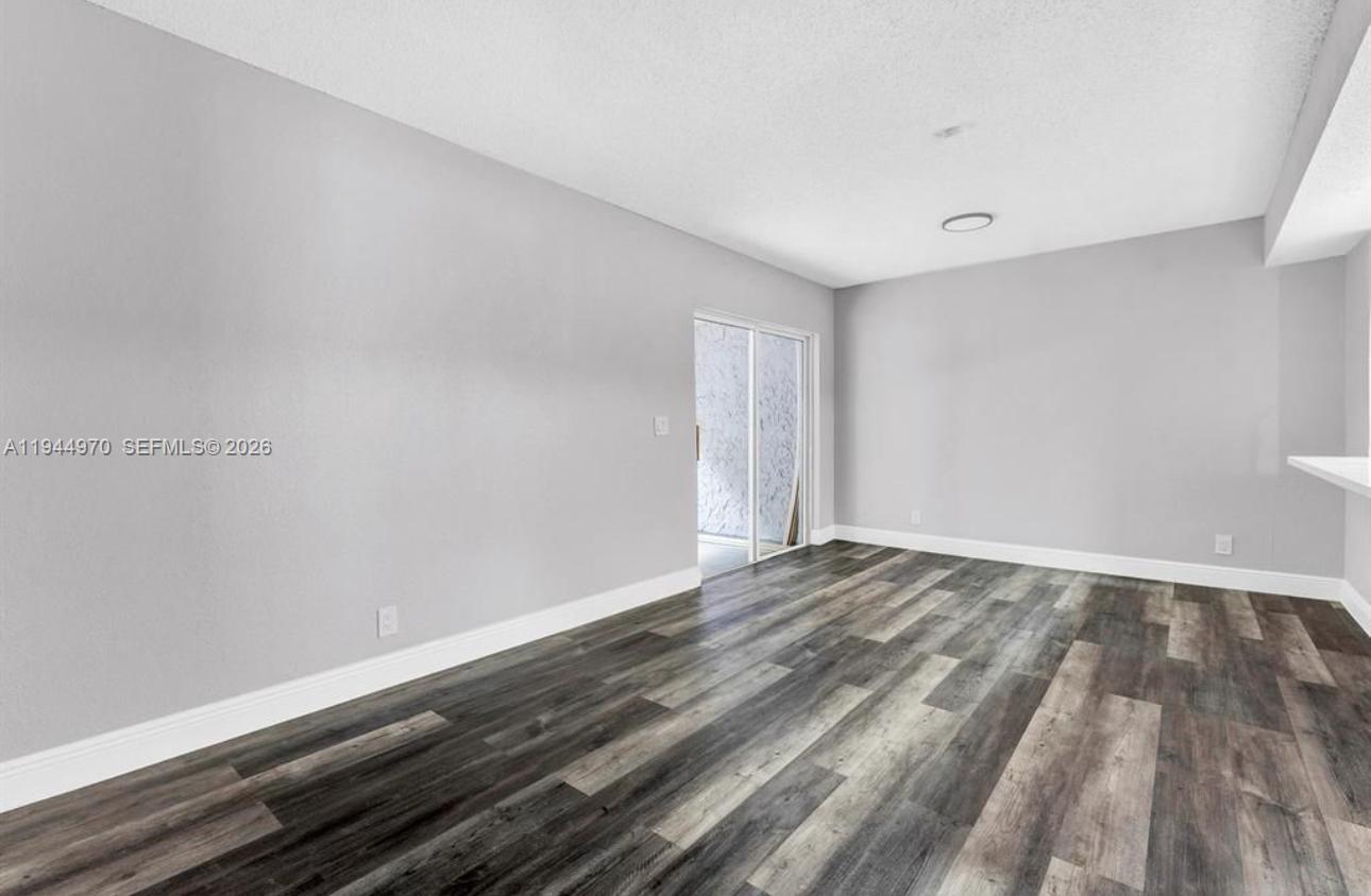 7402 Northwest 75th Street Tamarac, FL 33321 - Photo 34 of 38 a view of an empty room