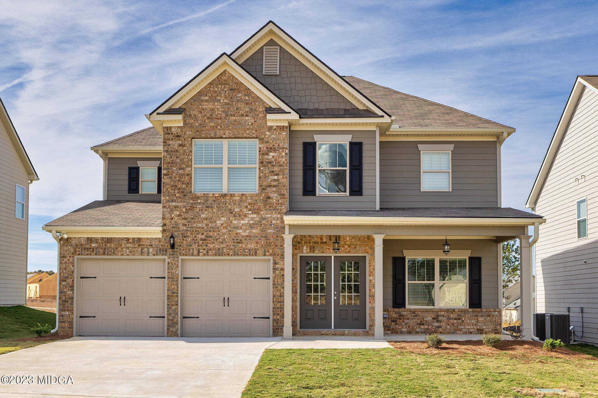 155 Cherokee Rose Drive Jackson, GA 30233 - Photo 1 of 32 a front view of a house with a yard