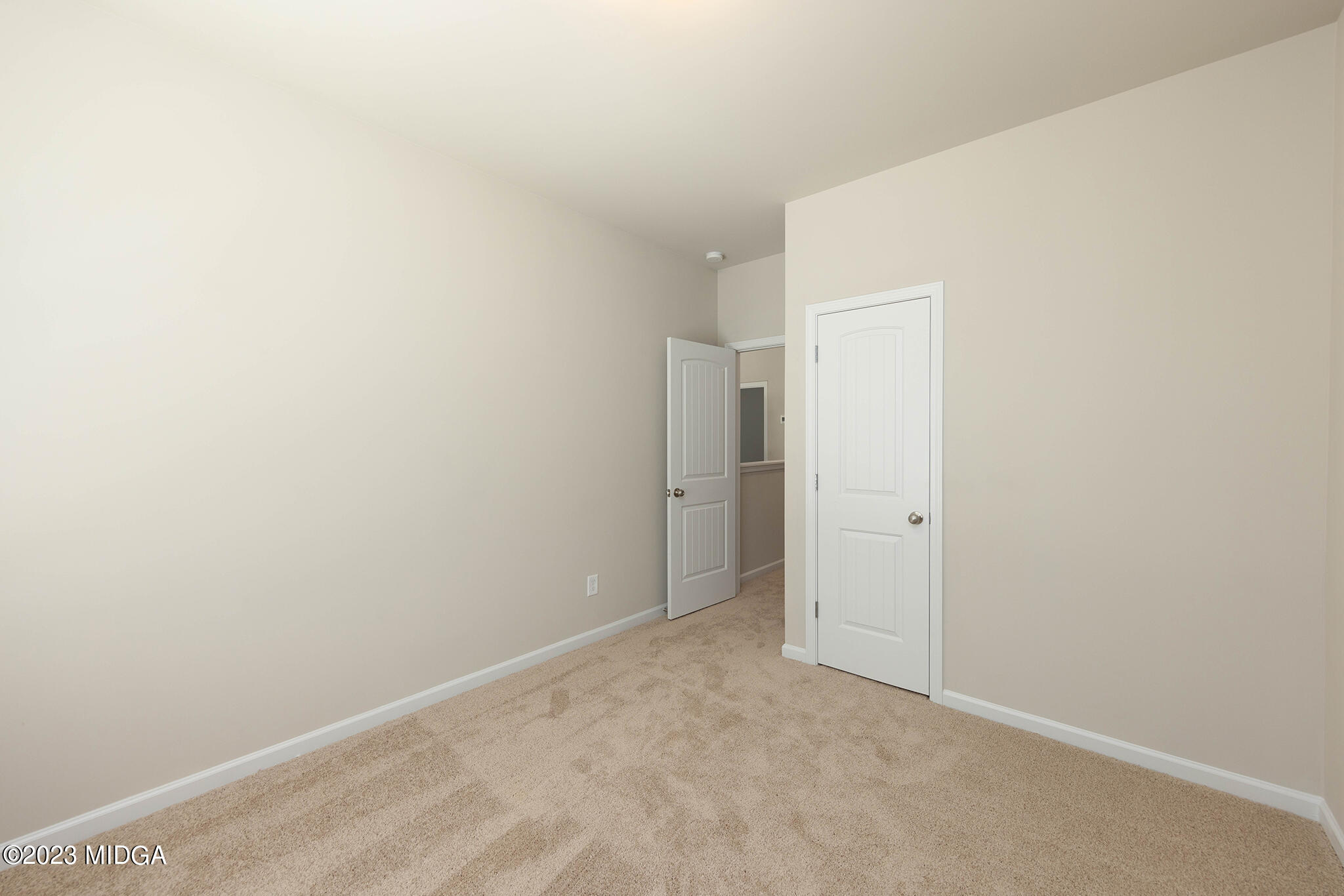 155 Cherokee Rose Drive Jackson, GA 30233 - Photo 17 of 32 a view of an empty room