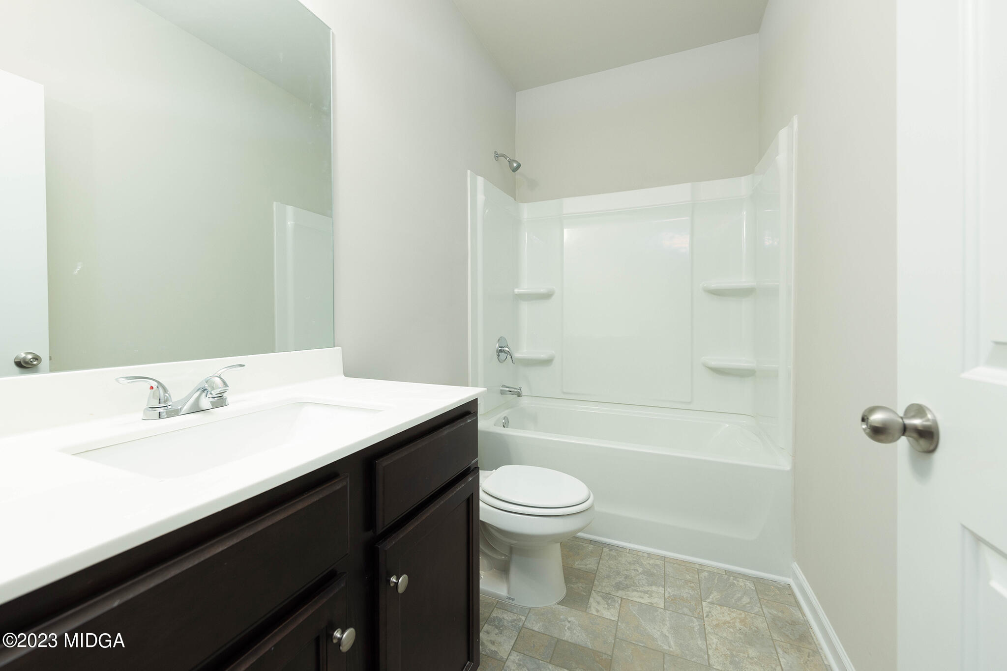 155 Cherokee Rose Drive Jackson, GA 30233 - Photo 20 of 32 a bathroom with a sink a toilet and shower