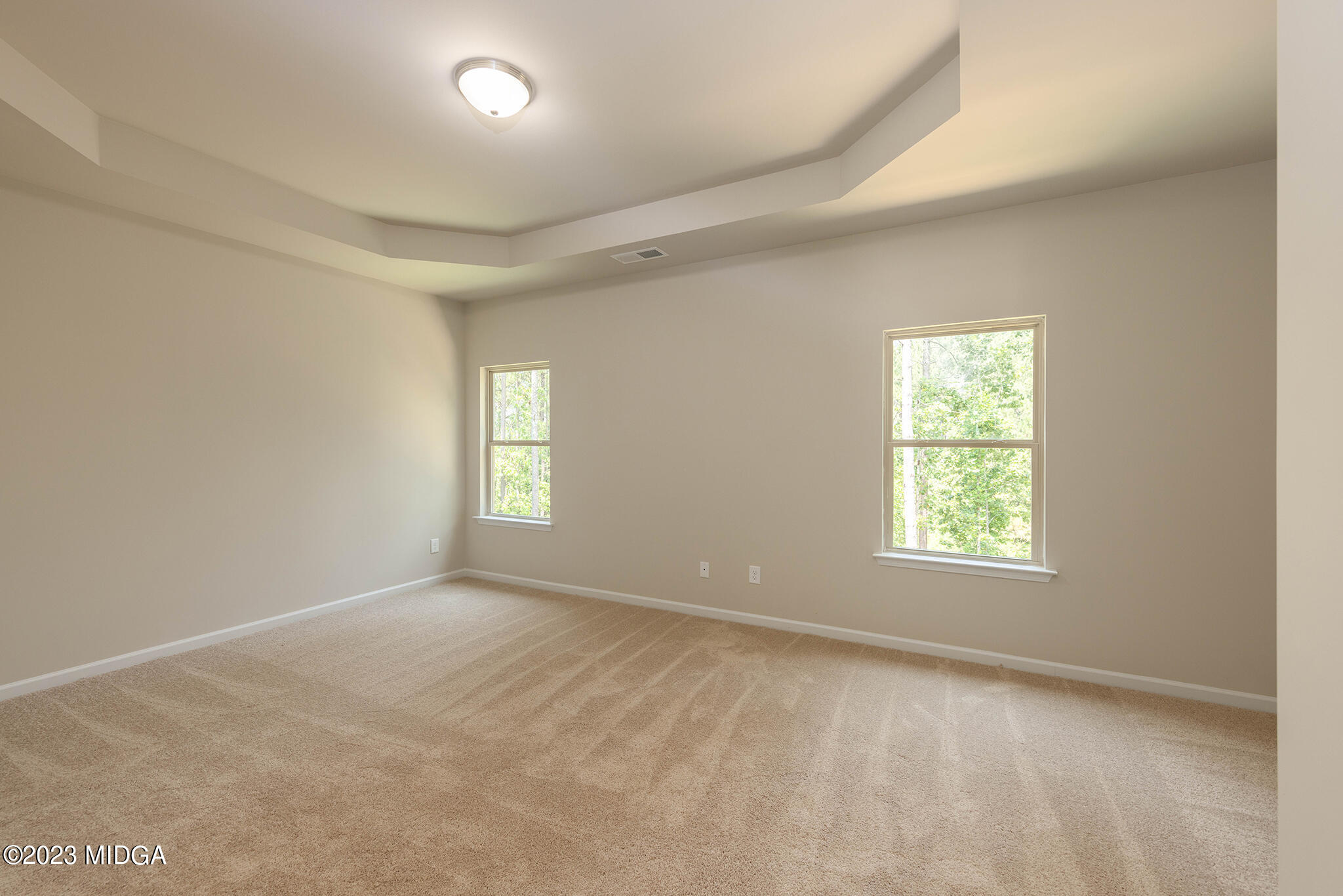 155 Cherokee Rose Drive Jackson, GA 30233 - Photo 23 of 32 an empty room with windows