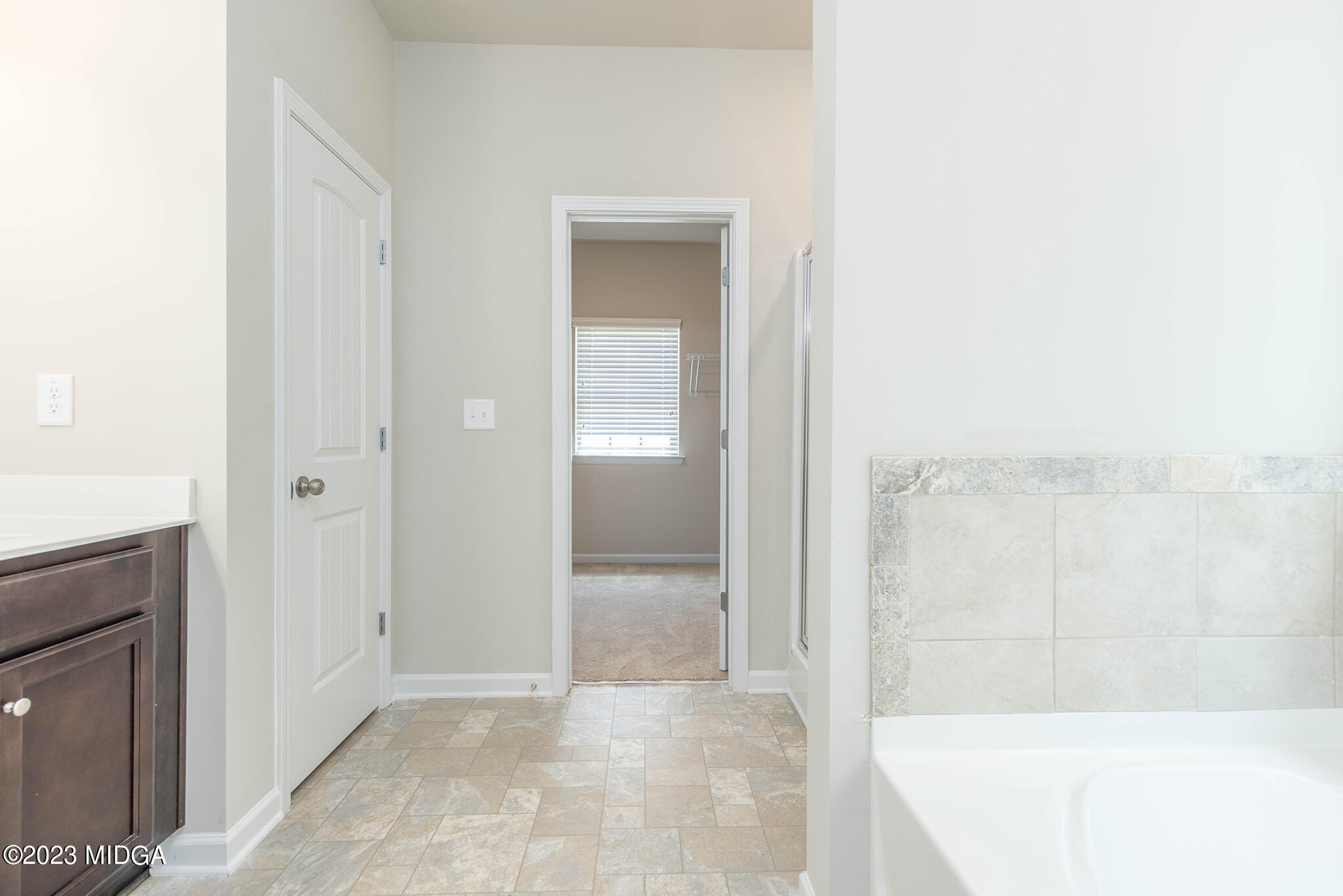 155 Cherokee Rose Drive Jackson, GA 30233 - Photo 27 of 32 a view of a bathroom with a bathtub
