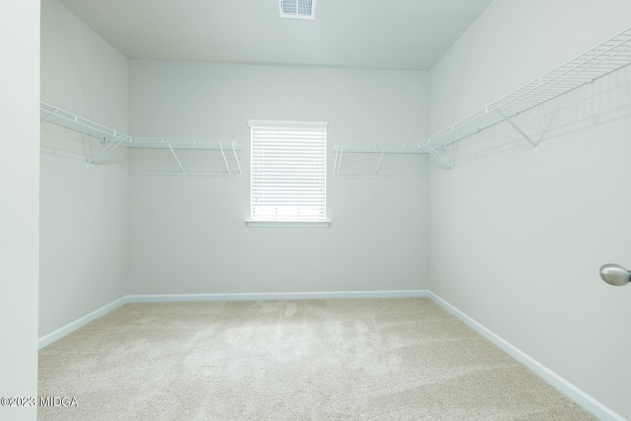 155 Cherokee Rose Drive Jackson, GA 30233 - Photo 29 of 32 an empty room with a window