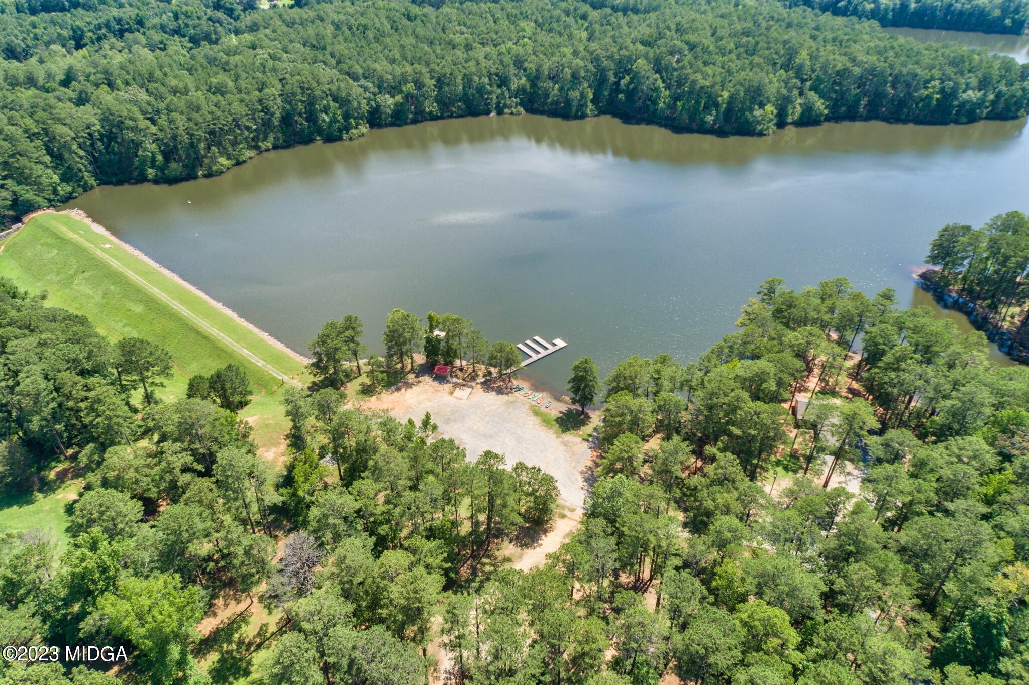 155 Cherokee Rose Drive Jackson, GA 30233 - Photo 31 of 32 an aerial view of a house with a yard and lake view