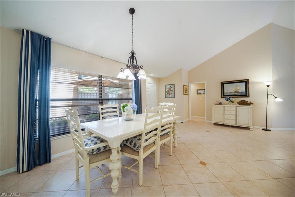 811 Reef Point Circle, Unit 90 Naples, FL 34108 - Photo 11 of 28 a view of a dining room with furniture window and outside view