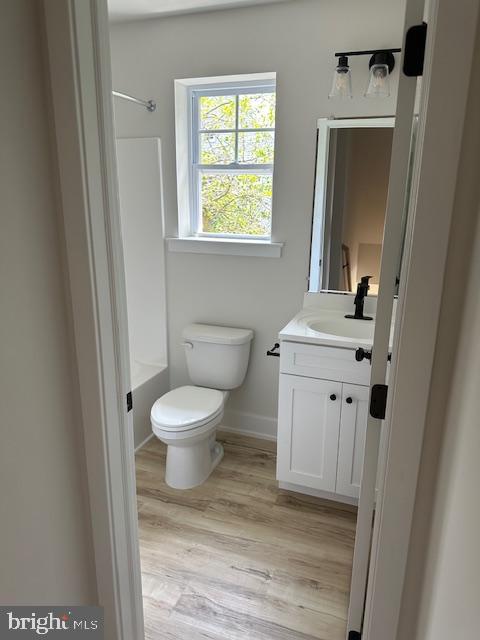 15 3rd Street Brooklawn, NJ 08030 - Photo 13 of 13 a bathroom with a toilet a sink and a mirror