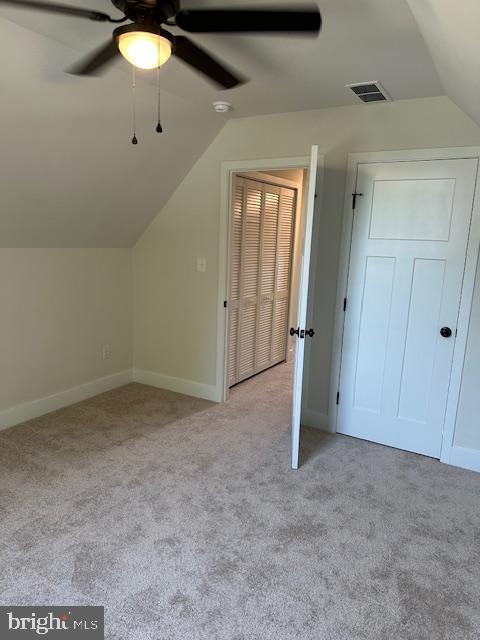 15 3rd Street Brooklawn, NJ 08030 - Photo 9 of 13 an empty room with a ceiling fan and carpet