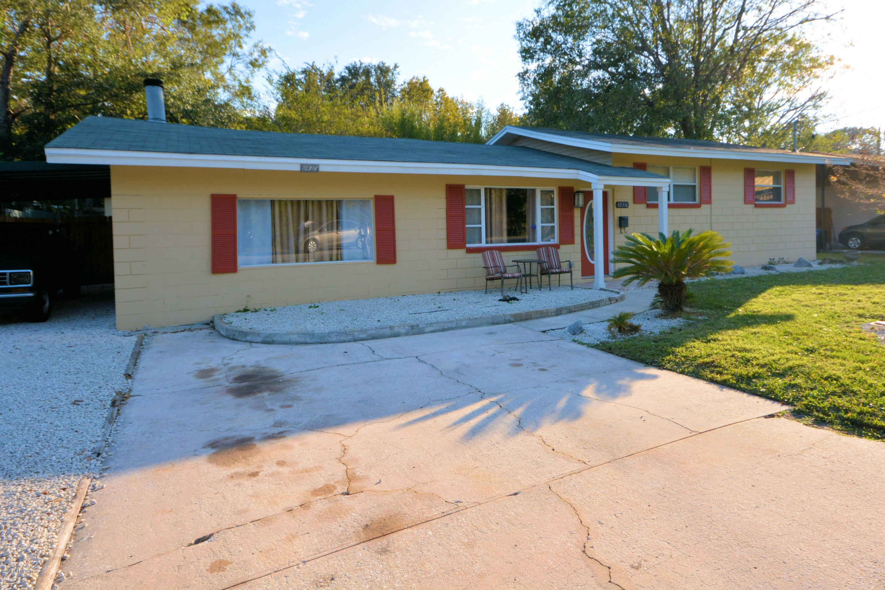 10316 Jolynn Road Jacksonville, FL 32225 - Photo 3 of 18 Carport and extra wide driveway