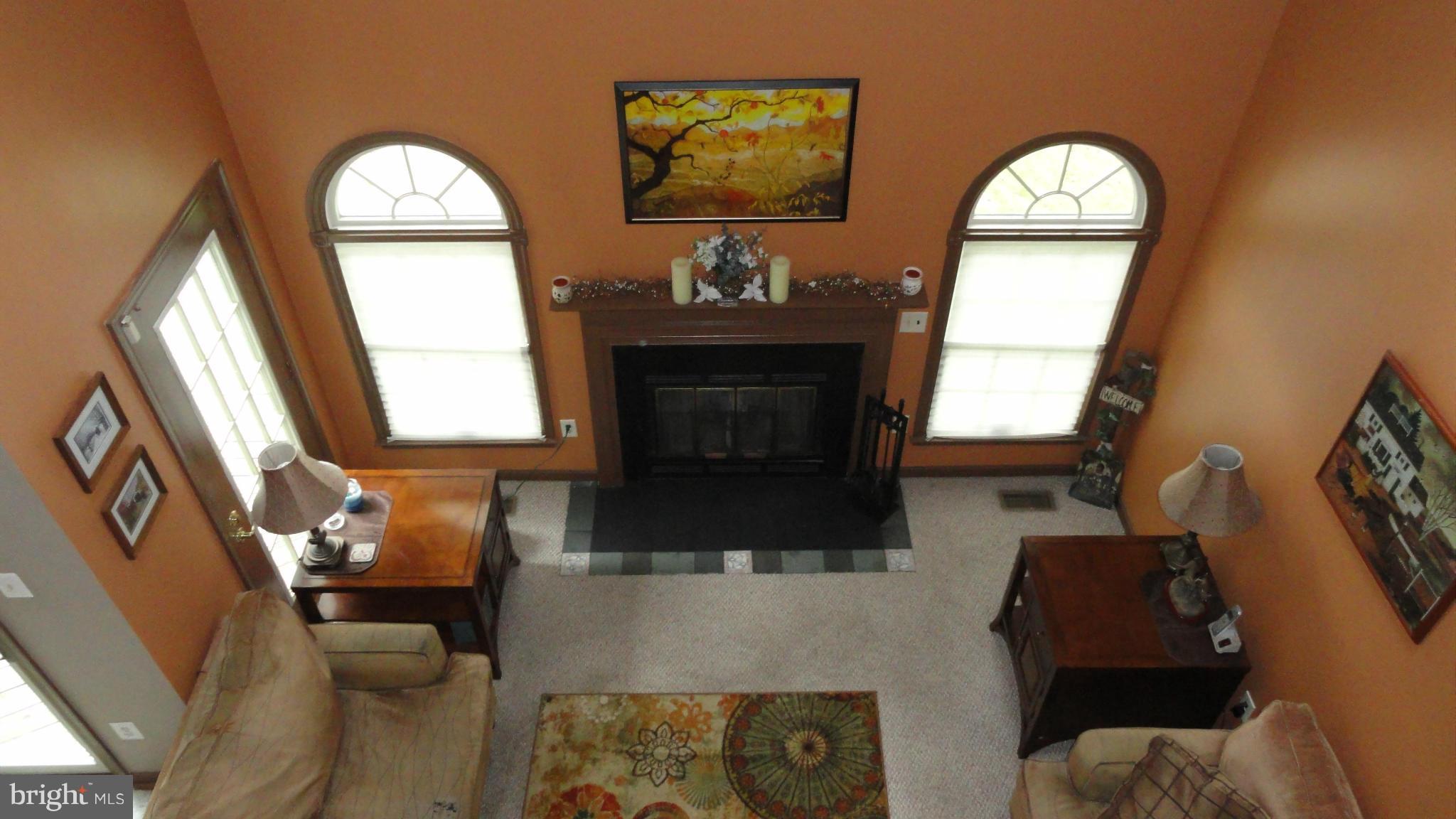 1021 Rodgers Road Churchton, MD 20733 - Photo 14 of 29 a living room with furniture and a fireplace