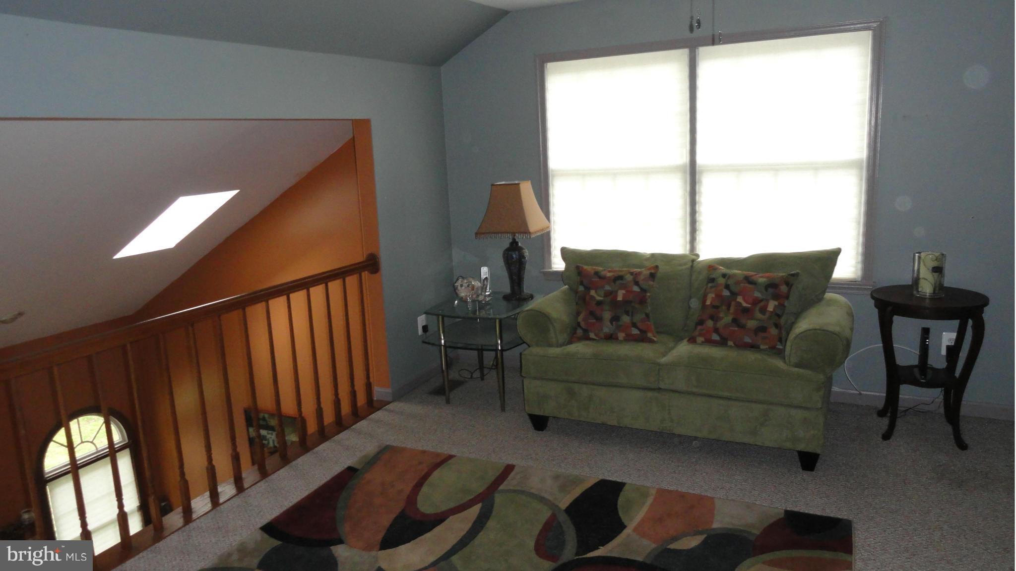 1021 Rodgers Road Churchton, MD 20733 - Photo 17 of 29 a living room with furniture and a window