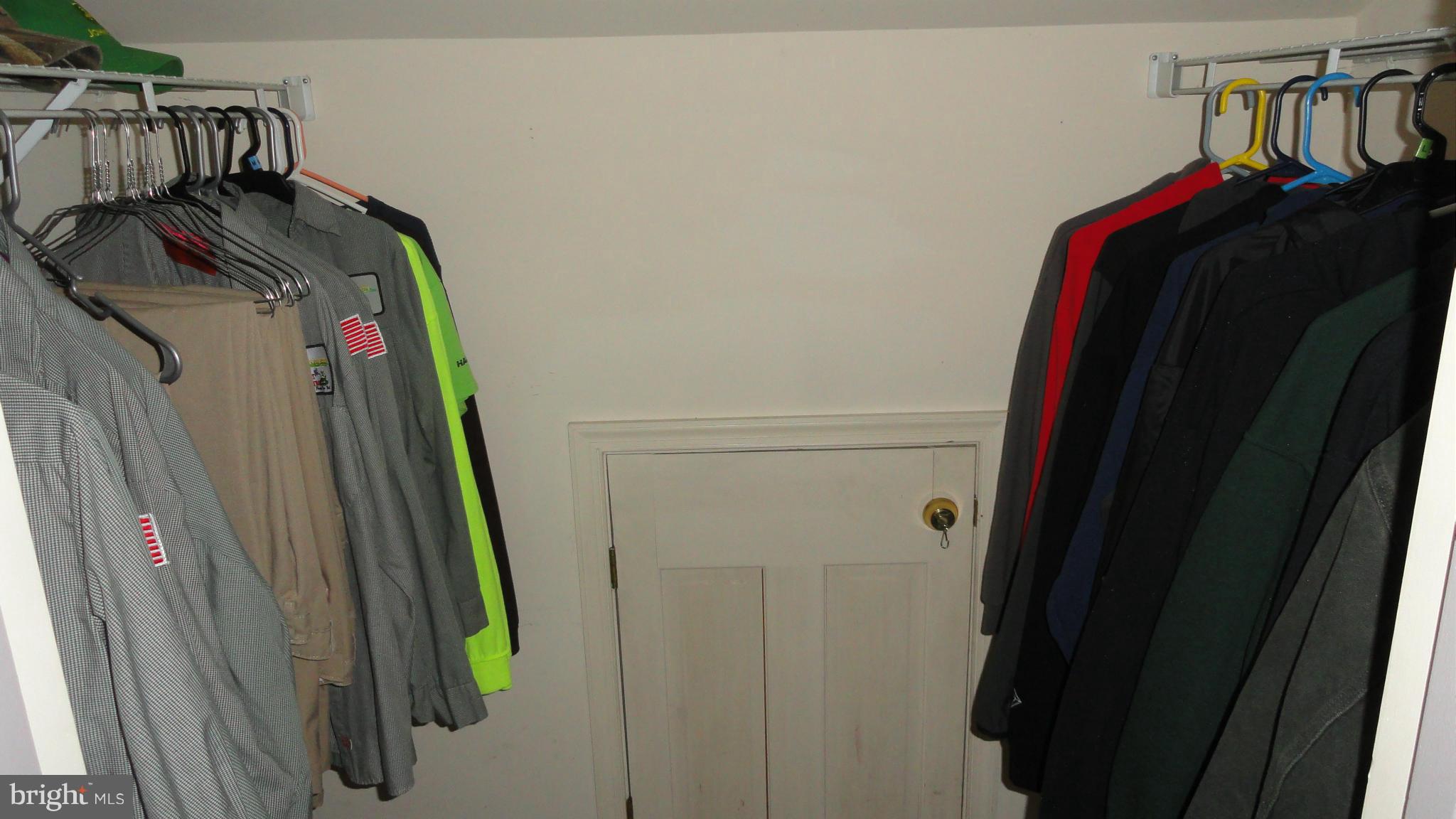 1021 Rodgers Road Churchton, MD 20733 - Photo 28 of 29 a view of walk in closet with clothes and shoes