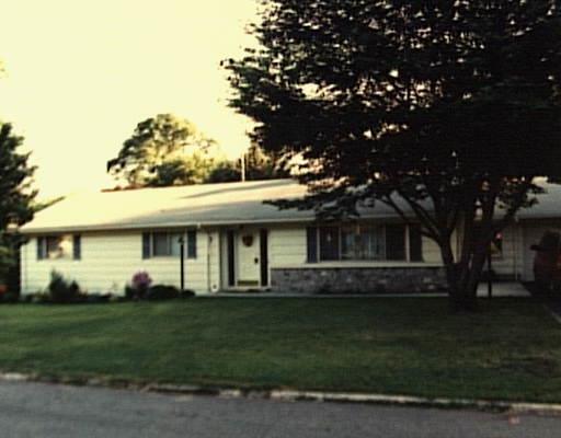 310 Oak Ridge Road Stratford, CT 06614 - Photo 1 of 1 a front view of a house with a garden