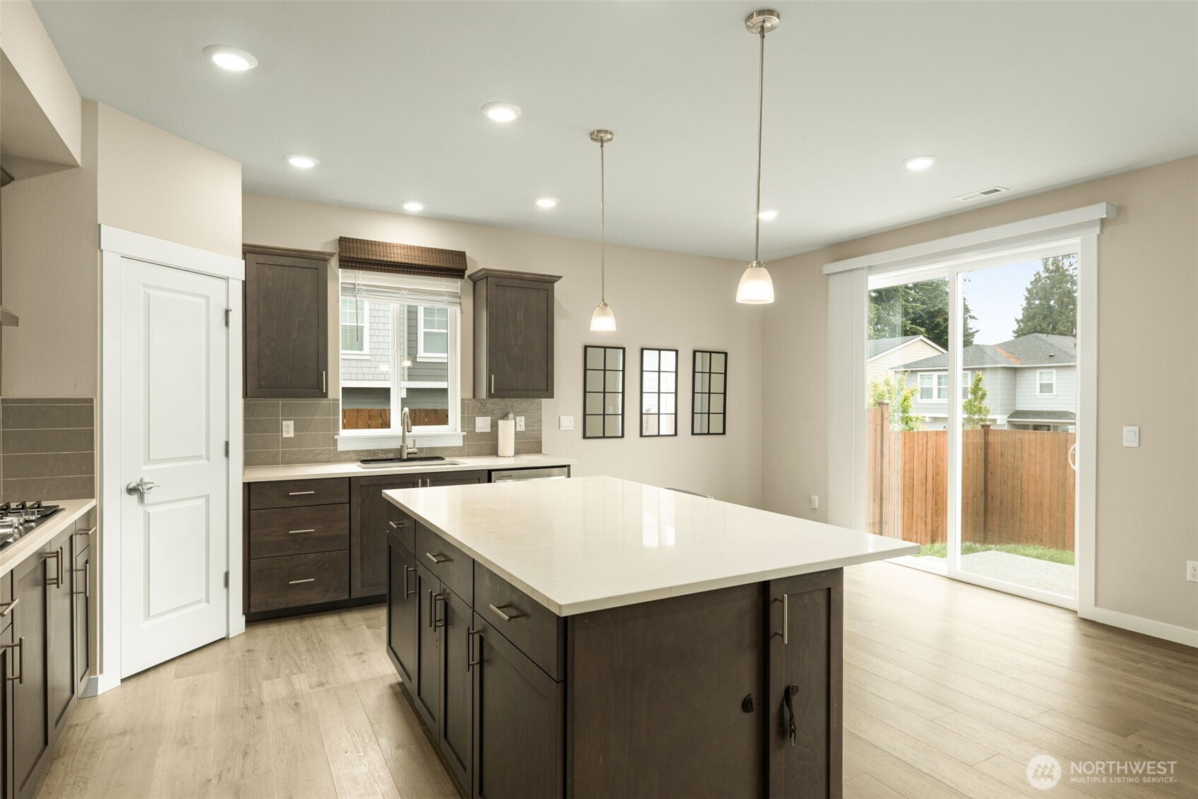 19410 28th Drive Southeast Bothell, WA 98012 - Photo 13 of 37 a kitchen with a stove sink and refrigerator