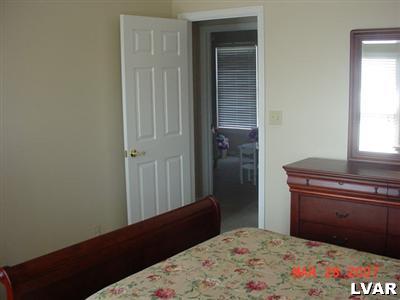 3497 Gun Club Road Nazareth, PA 18064 - Photo 8 of 17 a bedroom with a bed and a dresser