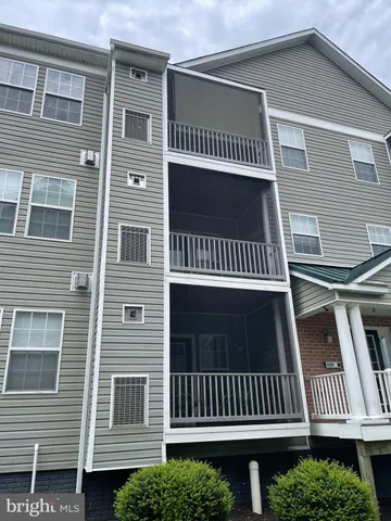 a view of a brick house with a window
