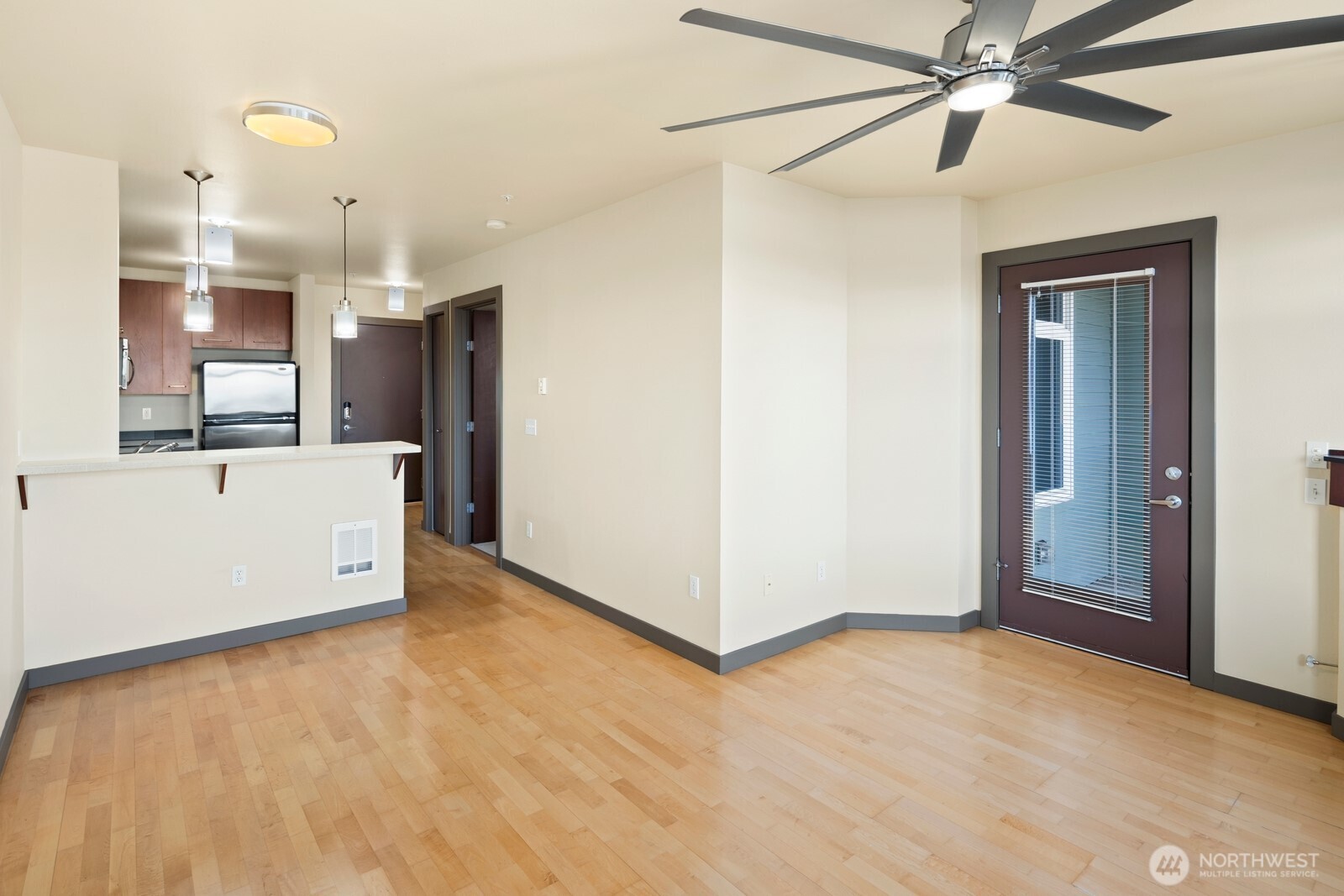 655 Crockett Street, Unit A305 Seattle, WA 98109 - Photo 11 of 23 a view of a kitchen with a sink and cabinet area
