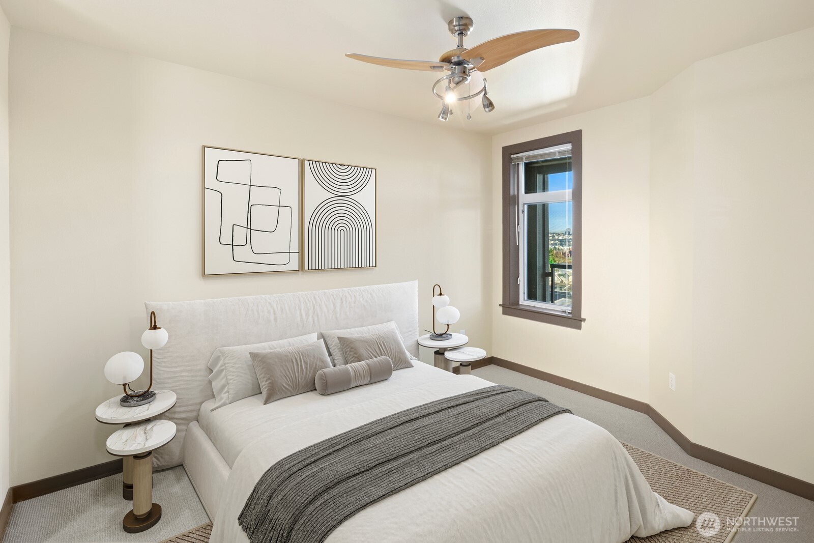 655 Crockett Street, Unit A305 Seattle, WA 98109 - Photo 12 of 23 a bedroom with a bed and a window