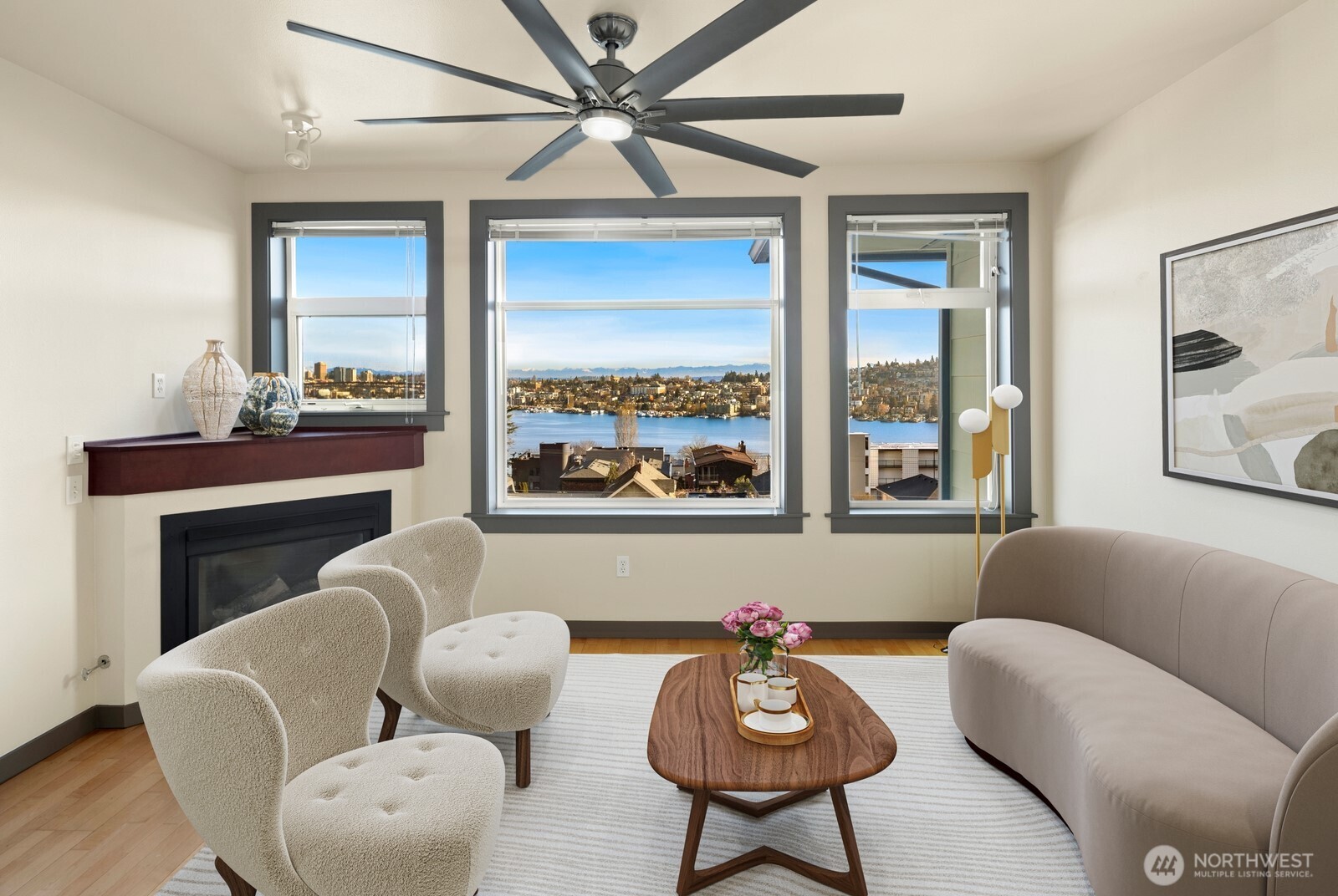 655 Crockett Street, Unit A305 Seattle, WA 98109 - Photo 5 of 23 a living room with furniture and a large window