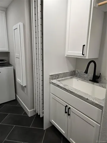 a bed room with a bed and a window