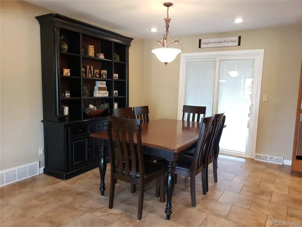 a view of a dining room with furniture