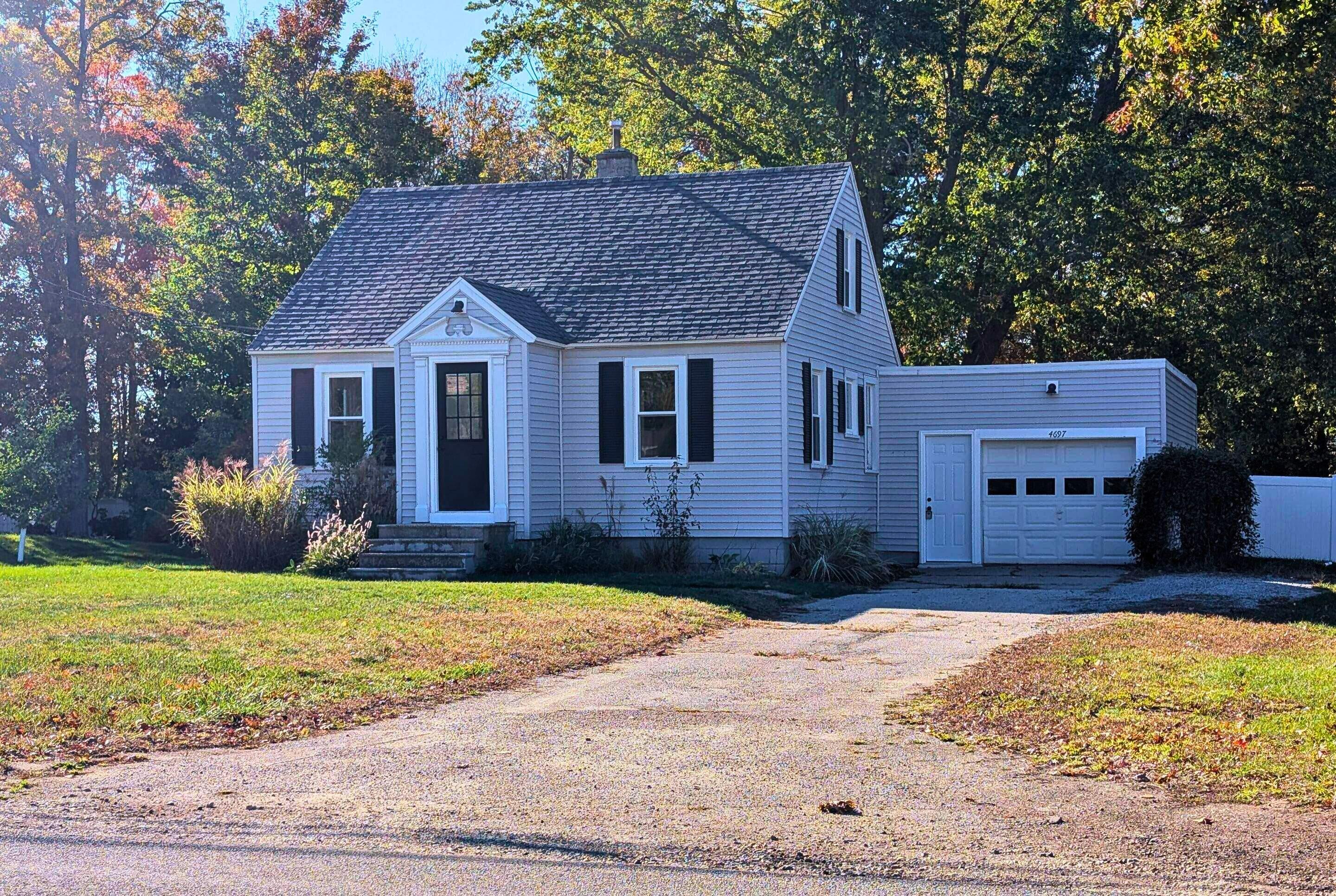 4697 Quarterline Road Muskegon, MI 49444 - Photo 1 of 9 Front