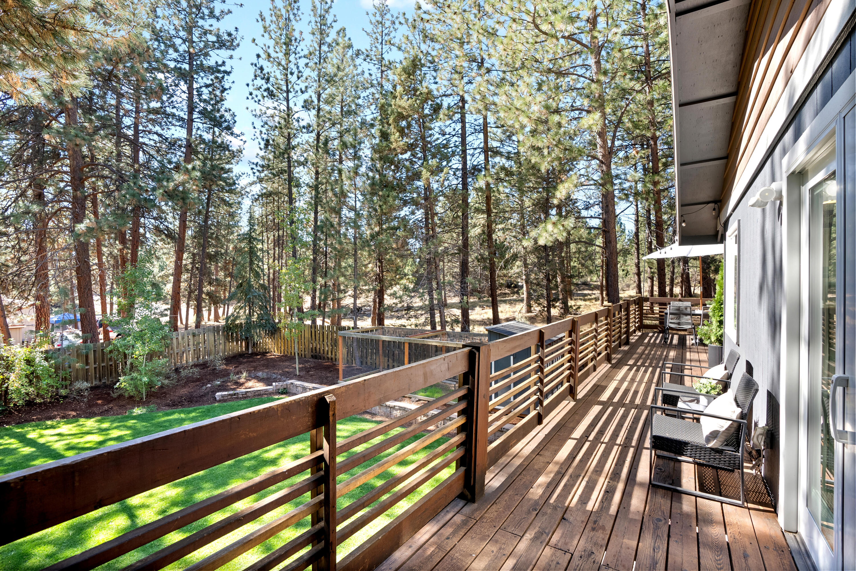 1961 Southwest Knoll Avenue Bend, OR 97702 - Photo 42 of 53 a view of balcony with wooden floor and fence