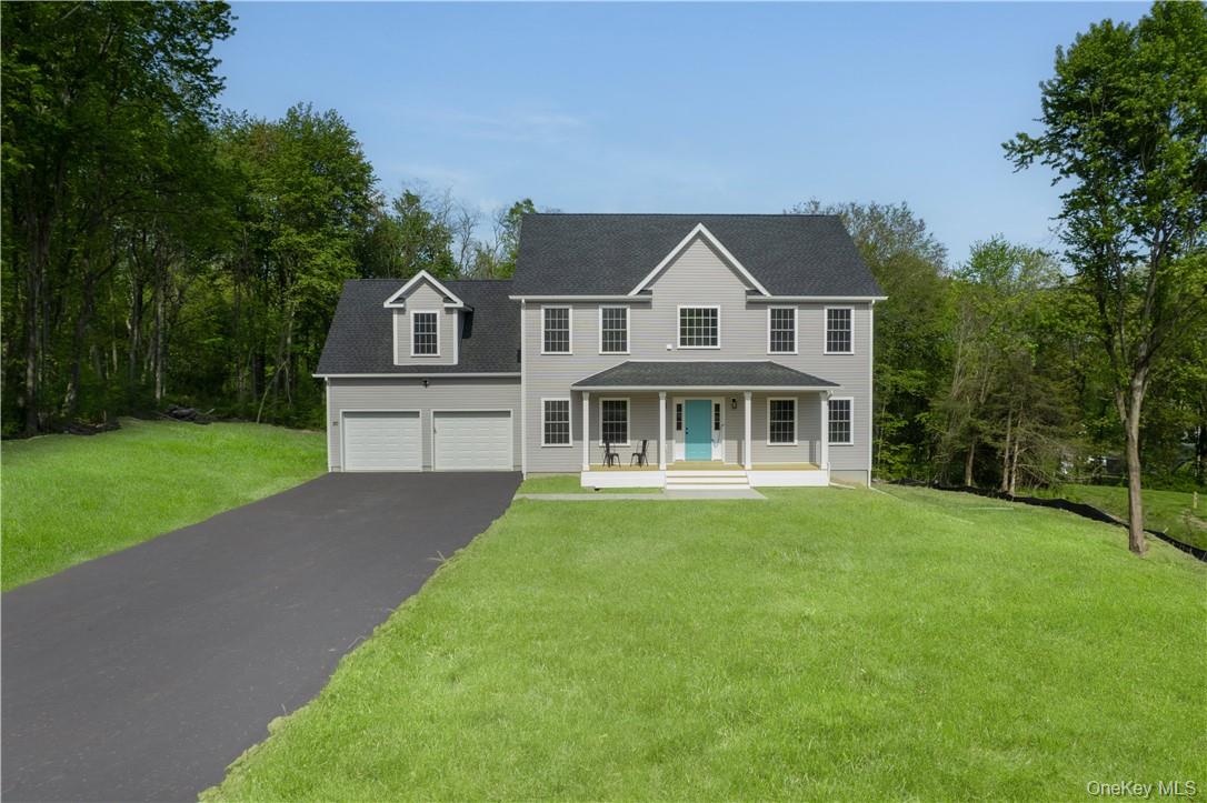 991 Freedom Road Pleasant Valley, NY 12569 - Photo 1 of 23 a front view of a house with a yard