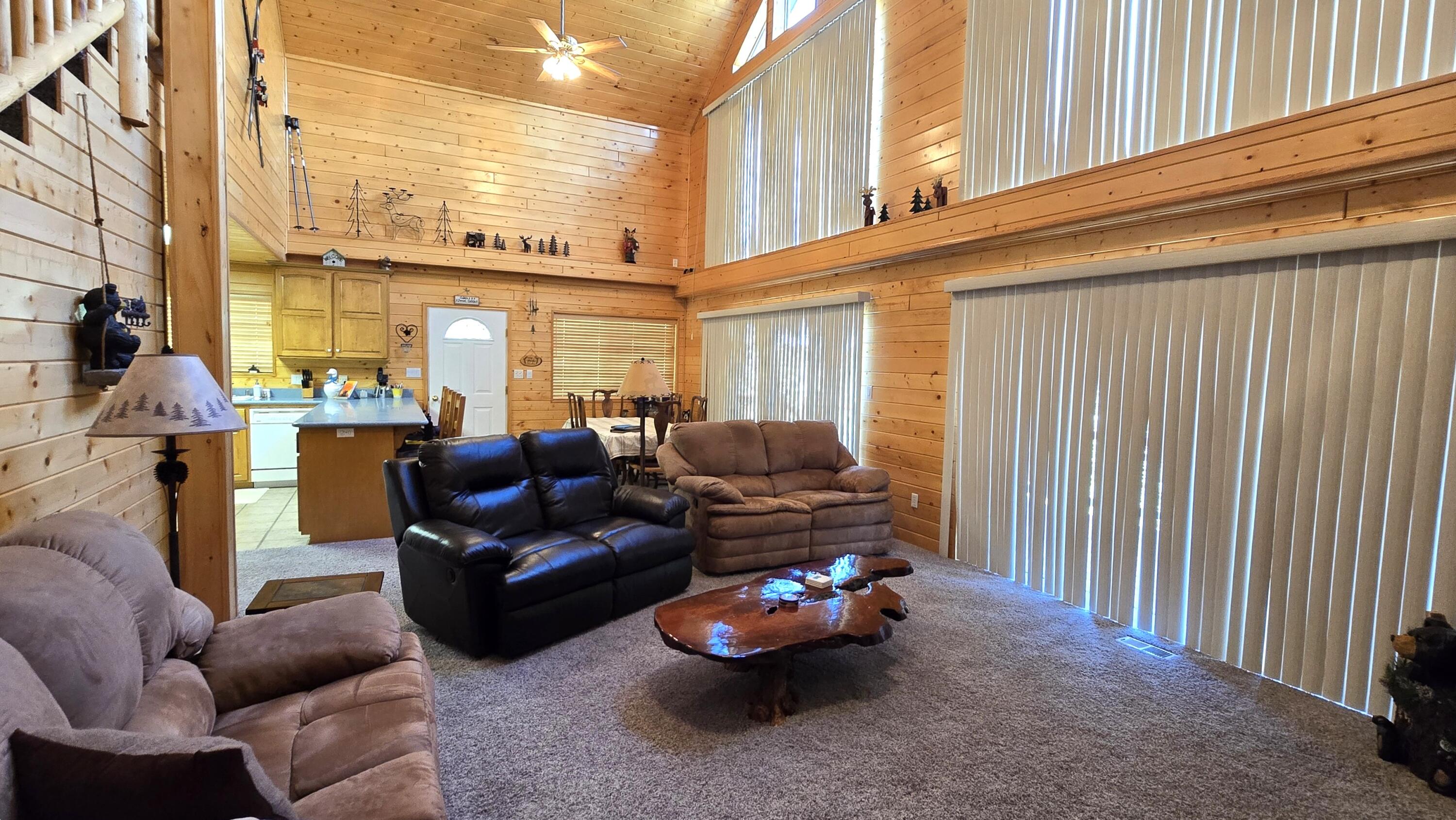650 South Ridge Point Drive Panguitch, UT 84759 - Photo 7 of 38 View 2 Living & dining rooms have sliding glass doors to the large deck. Tons of natural light from numerous windows & doors.