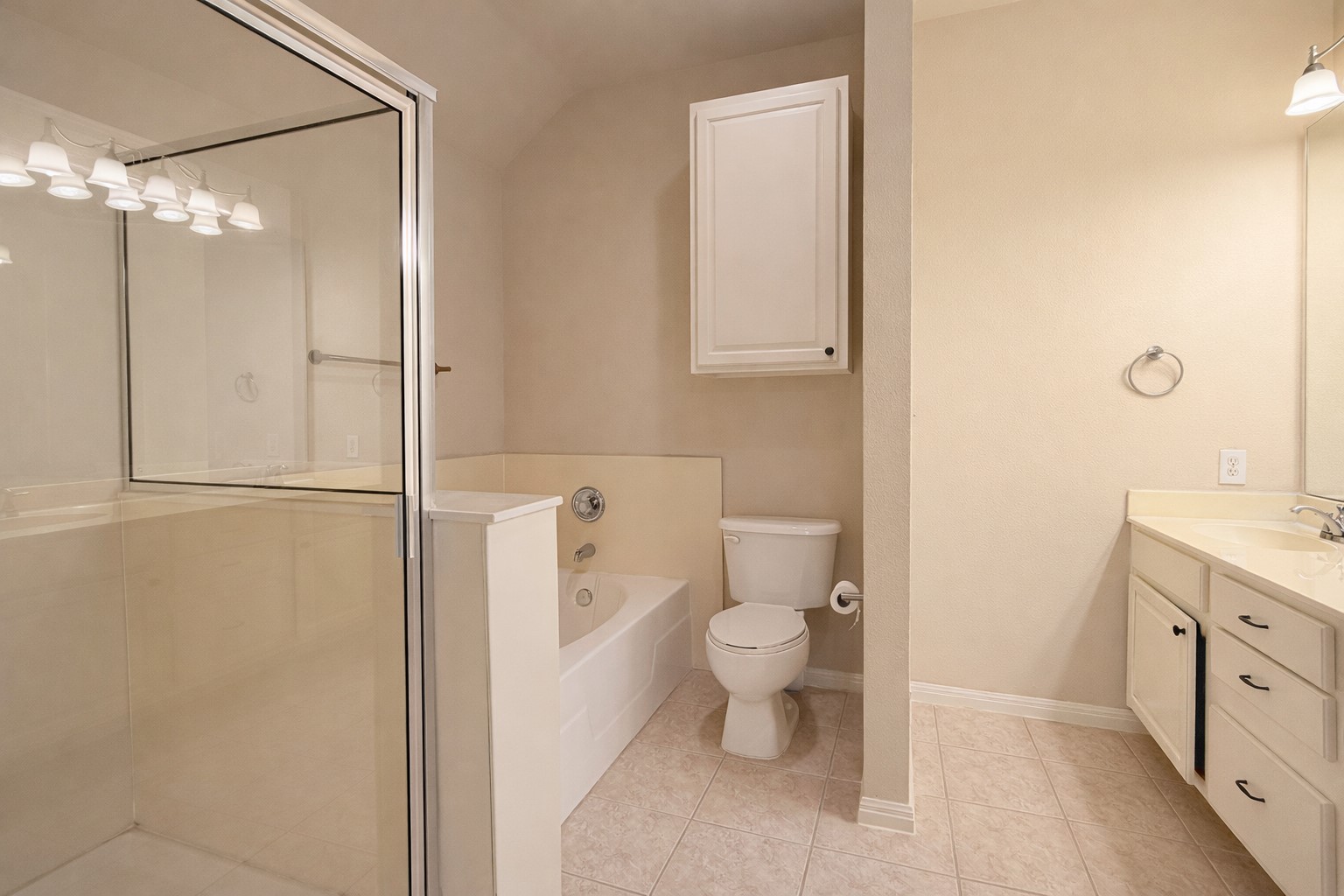 5515 Davis Lane, Unit 82 Austin, TX 78749 - Photo 14 of 20 a bathroom with a granite countertop sink toilet and shower