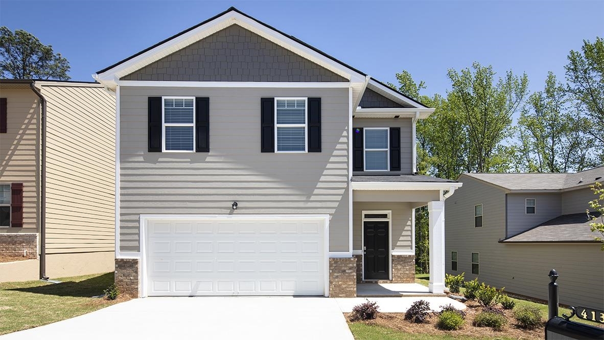 3234 Allison Circle, Unit 129 Decatur, GA 30034 - Photo 1 of 1 a front view of a house with a yard