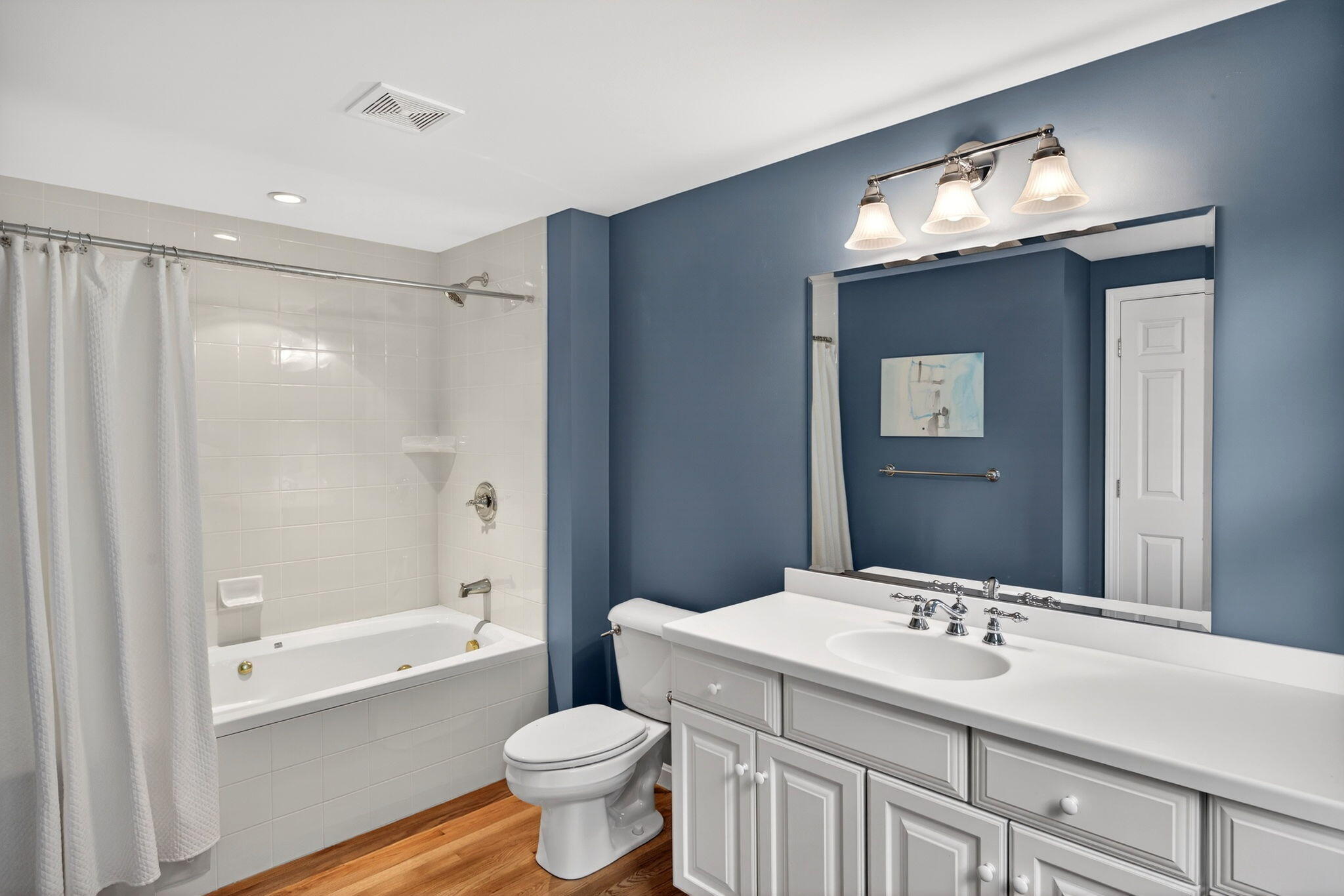 346 Morris Island Road Chatham, MA 02633 - Photo 21 of 33 a bathroom with a sink and a mirror