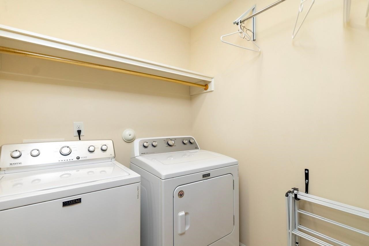 2033 Weston Green Loop Cary, NC 27513 - Photo 18 of 24 a utility room with dryer and washer
