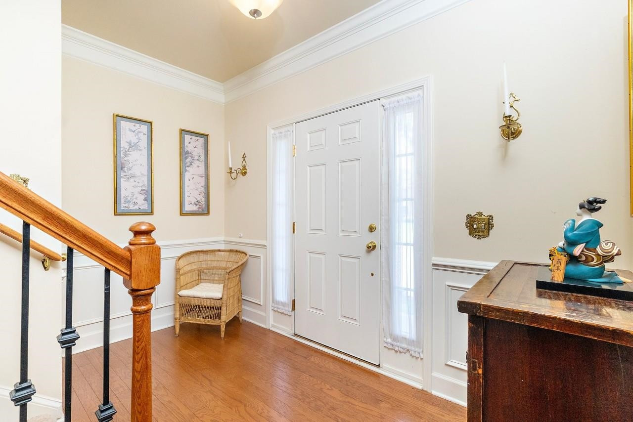 2033 Weston Green Loop Cary, NC 27513 - Photo 2 of 24 a view of living room with furniture and wooden floor