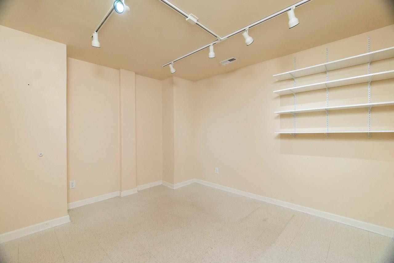 2033 Weston Green Loop Cary, NC 27513 - Photo 21 of 24 a view of an empty room