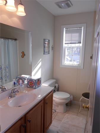 85 Dwight Road Springfield, MA 01108 - Photo 16 of 21 a bathroom with a sink a toilet and a mirror