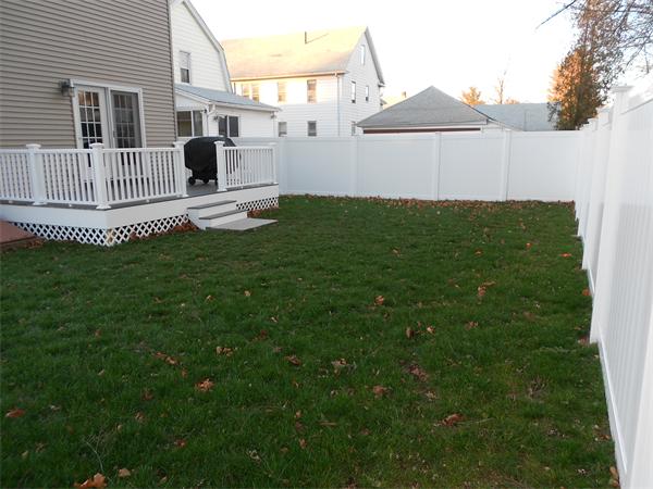85 Dwight Road Springfield, MA 01108 - Photo 18 of 21 a backyard of a house with table and chairs