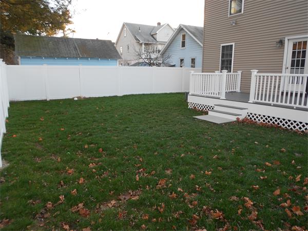 85 Dwight Road Springfield, MA 01108 - Photo 19 of 21 a view of house with backyard and a garden