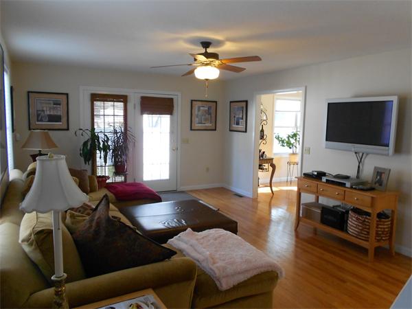 85 Dwight Road Springfield, MA 01108 - Photo 9 of 21 a living room with furniture and a flat screen tv