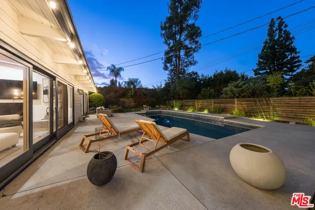 a house with trees in front of it