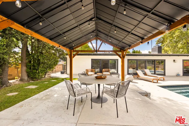 a view of a house with a swimming pool