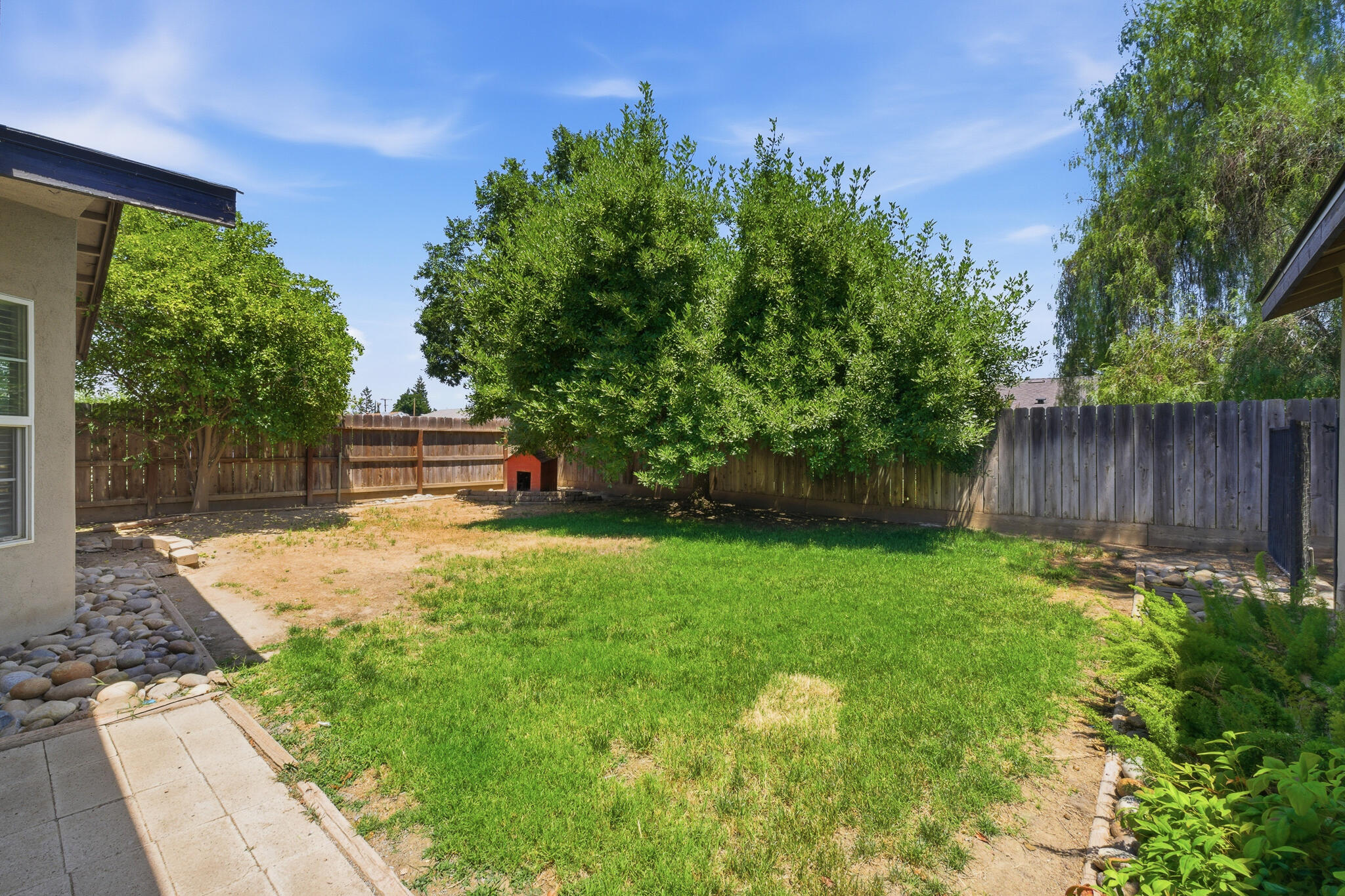 618 Birdsong Court Exeter, CA 93221 - Photo 59 of 62 a view of a backyard with sitting area
