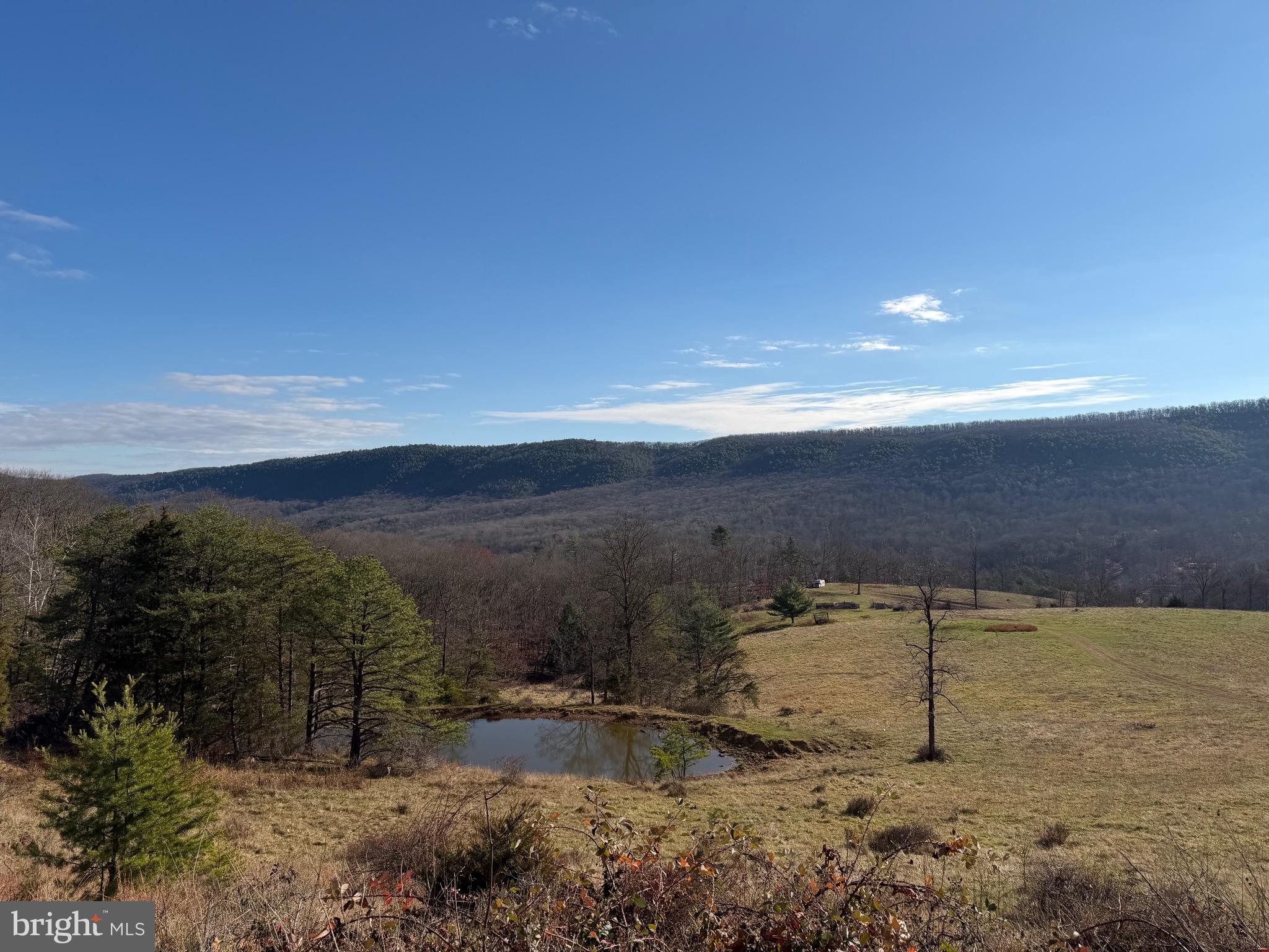 34.58 Ac Off Sperry's Run Road Rio, WV 26755 - Photo 14 of 17 a view of lake with mountain
