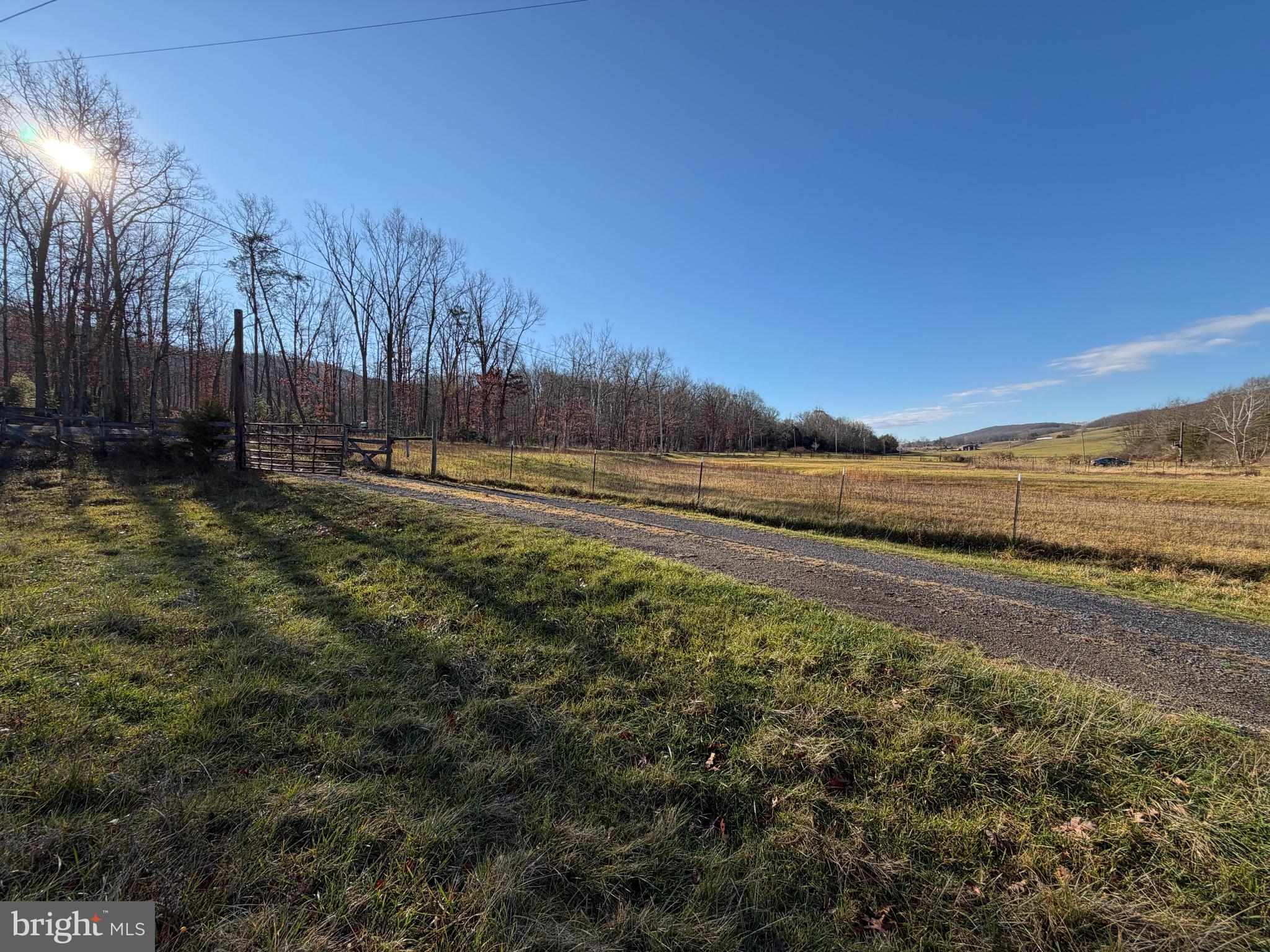 34.58 Ac Off Sperry's Run Road Rio, WV 26755 - Photo 17 of 17 a view of a field with trees in the background