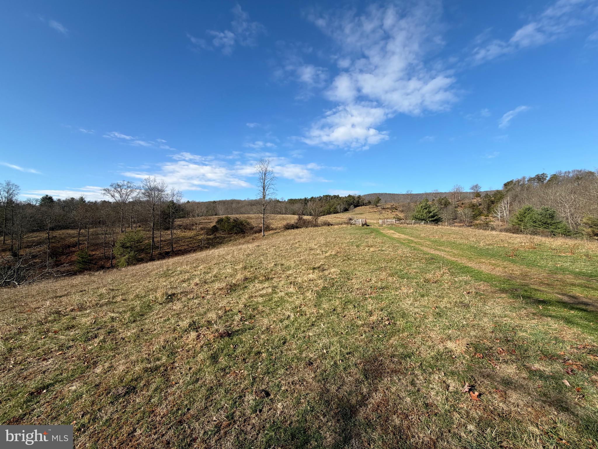 34.58 Ac Off Sperry's Run Road Rio, WV 26755 - Photo 5 of 17 a view of a field with an ocean