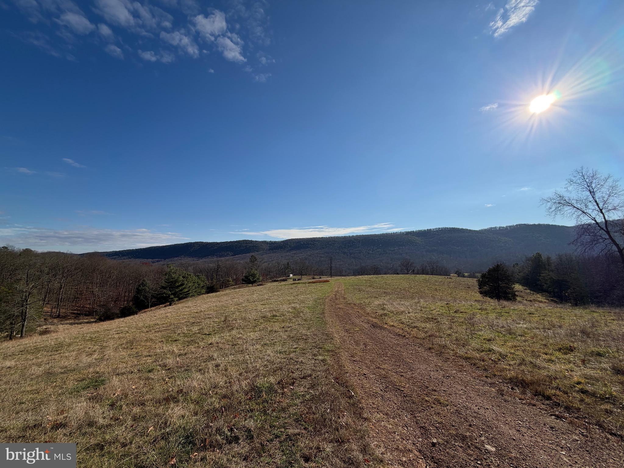 34.58 Ac Off Sperry's Run Road Rio, WV 26755 - Photo 10 of 17 a view of ocean beach and mountain