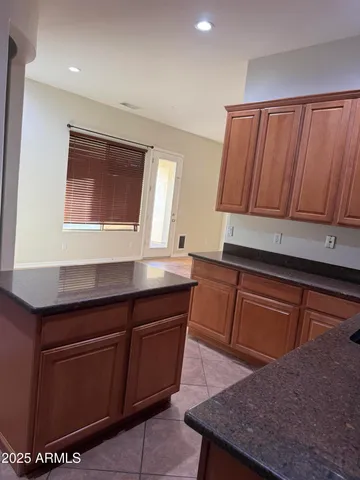a kitchen with sink and window