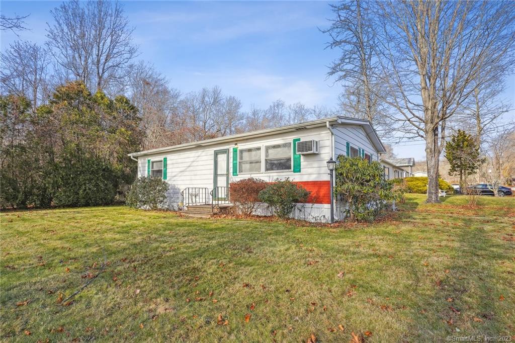 1 Old Forge Road Westbrook, CT 06498 - Photo 1 of 1 a view of a house with a yard and garage